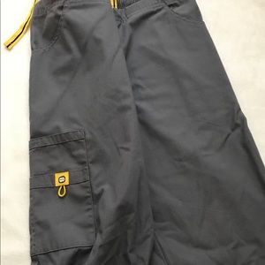 Spread Good Cheer flare scrub pants.